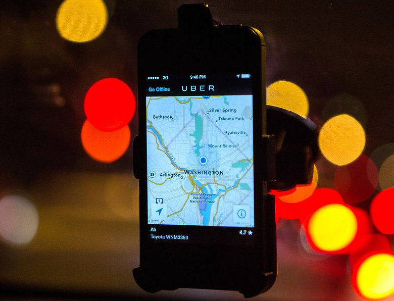 Приложение Uber для водителей и их клиентов (фото: Evelyn Hockstein / Getty Images).