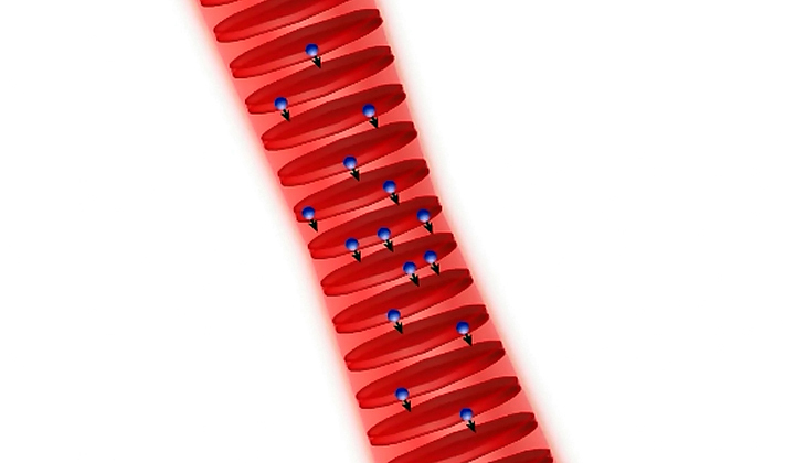 Атомы стронция в луче лазера (изображение:  J. Ye, B. J. Bloom et al. / Nature)