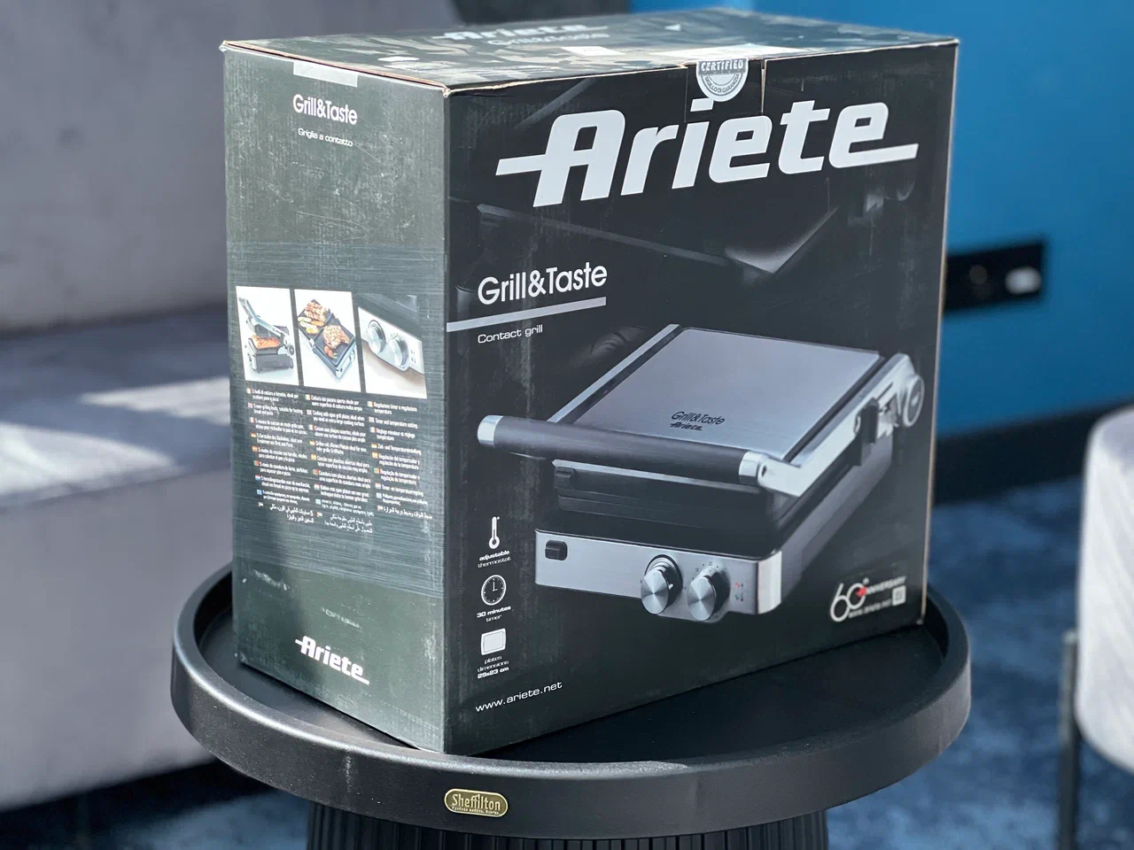 Черная коробка Ariete Grill&Taste с изображением гриля
